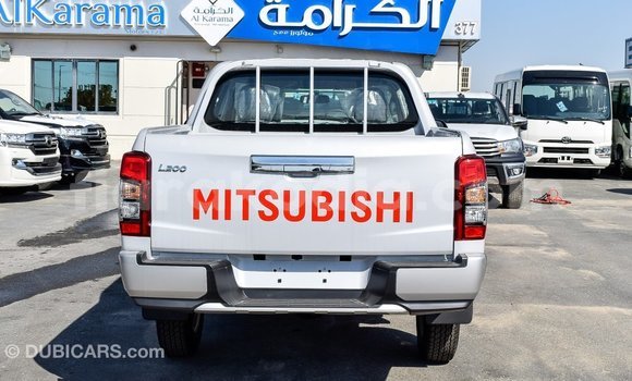 Buy Import Mitsubishi L200 White Car in Import - Dubai in Diana Buy Import Mitsubishi L200 White Car in Import - Dubai in Diana