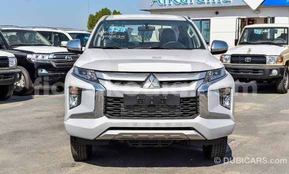 Buy Import Mitsubishi L200 White Car in Import - Dubai in Diana Buy Import Mitsubishi L200 White Car in Import - Dubai in Diana