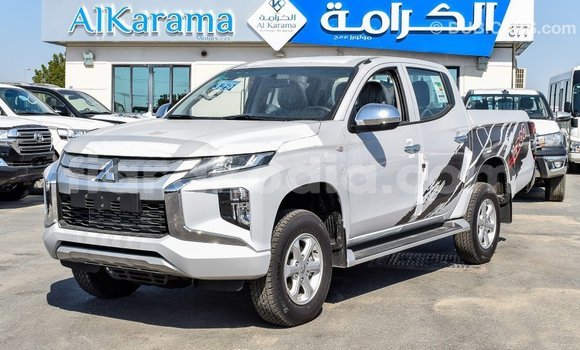 Buy Import Mitsubishi L200 White Car in Import - Dubai in Diana Buy Import Mitsubishi L200 White Car in Import - Dubai in Diana