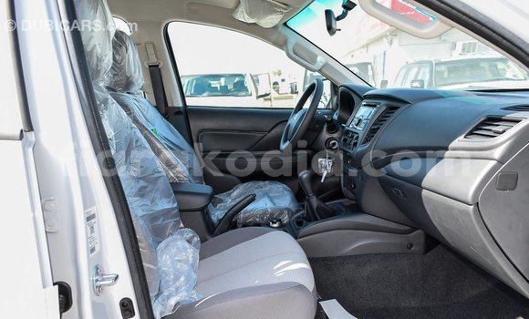 Buy Import Mitsubishi L200 White Car in Import - Dubai in Diana Buy Import Mitsubishi L200 White Car in Import - Dubai in Diana