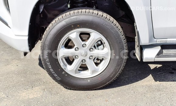 Buy Import Mitsubishi L200 White Car in Import - Dubai in Diana Buy Import Mitsubishi L200 White Car in Import - Dubai in Diana
