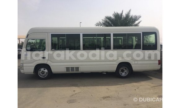 Acheter Import Voiture Toyota Coaster Blanc à Import - Dubai, Diana Acheter Import Voiture Toyota Coaster Blanc à Import - Dubai, Diana