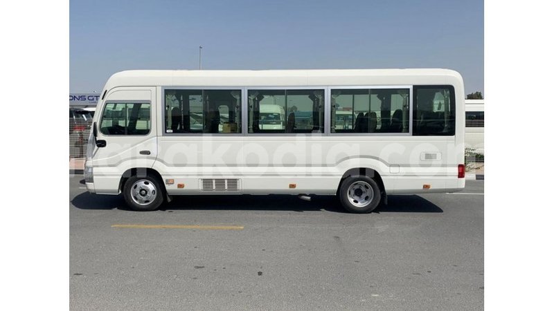 Big with watermark toyota coaster diana import dubai 5600