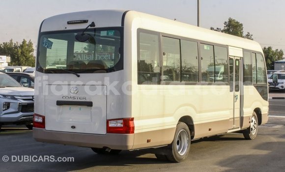 Acheter Import Voiture Toyota Coaster Blanc à Import - Dubai, Diana Acheter Import Voiture Toyota Coaster Blanc à Import - Dubai, Diana