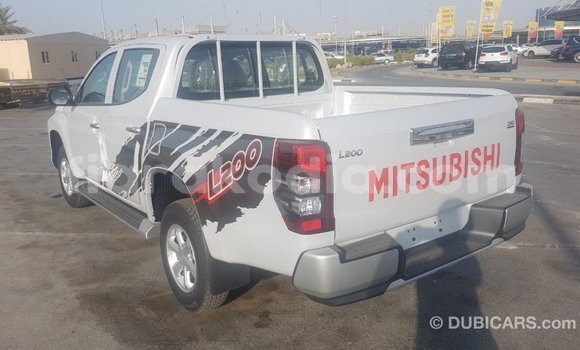 Buy Import Mitsubishi L200 White Car in Import - Dubai in Diana Buy Import Mitsubishi L200 White Car in Import - Dubai in Diana