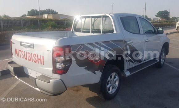 Buy Import Mitsubishi L200 White Car in Import - Dubai in Diana Buy Import Mitsubishi L200 White Car in Import - Dubai in Diana