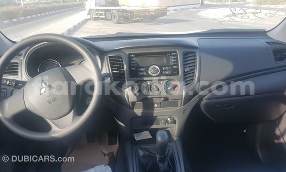 Buy Import Mitsubishi L200 White Car in Import - Dubai in Diana Buy Import Mitsubishi L200 White Car in Import - Dubai in Diana